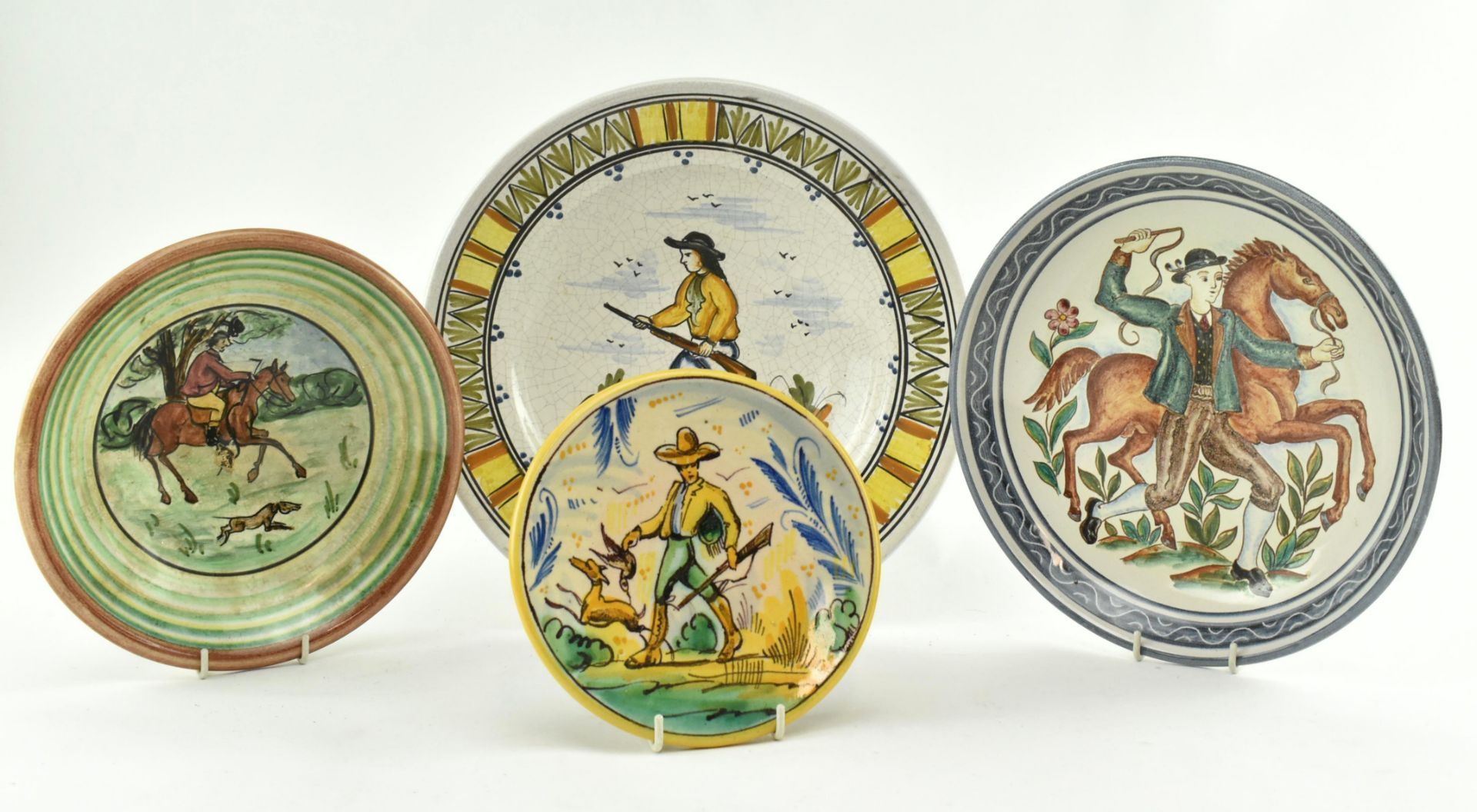 COLLECTION OF FOUR VINTAGE MAJOLICA STYLE TIN GLAZED PLATES