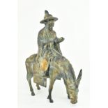 20TH CENTURY CHINESE CAST IRON WISE MAN RIDING HORSE