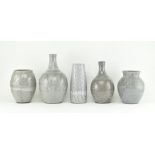 FIVE PIECES OF SLIPWARE STUDIO POTTERY IN GREY GLAZE