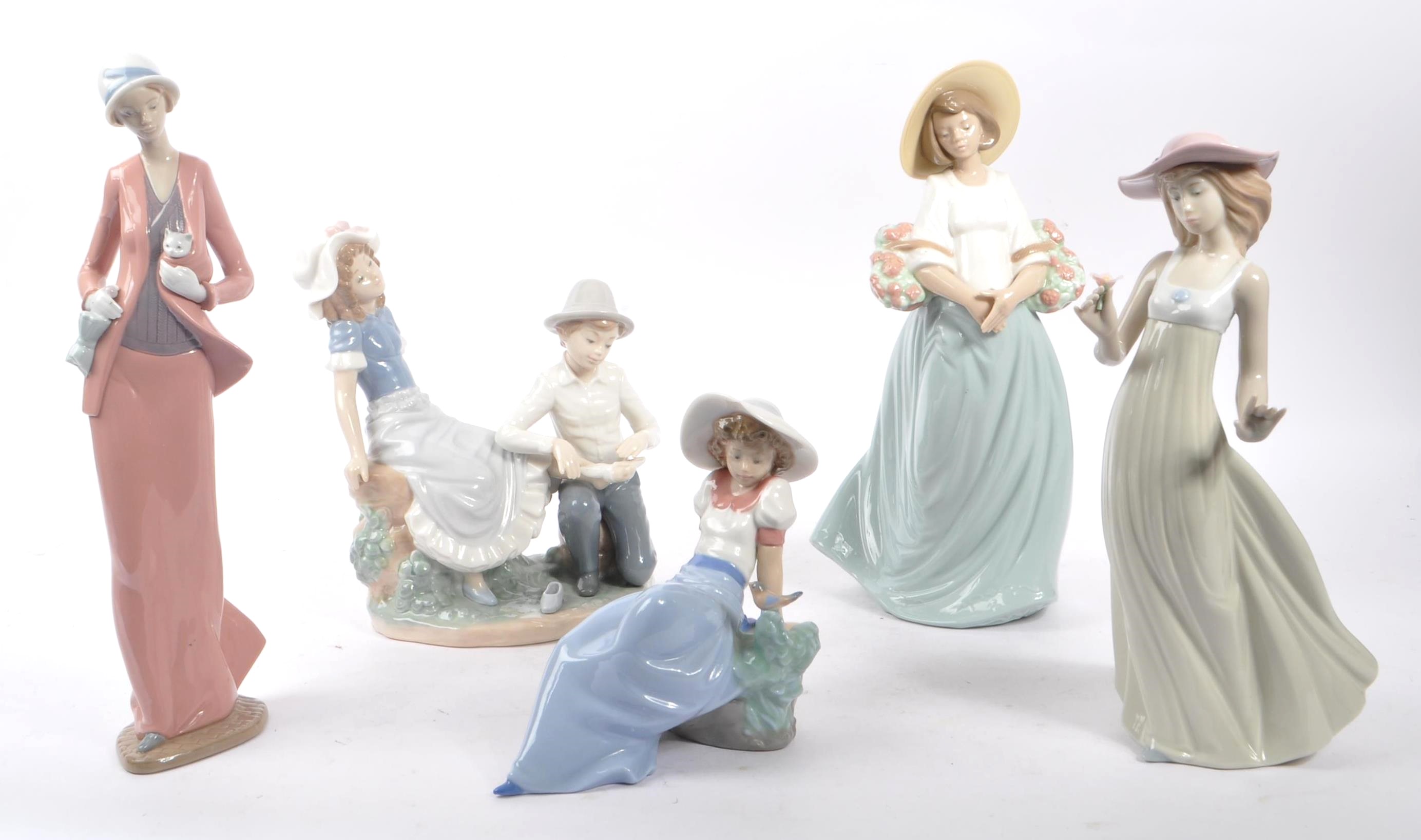 NAO BY LLADRO - COLLECTION OF FIVE PORCELAIN FIGURES