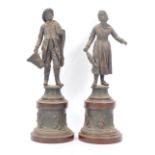 TWO 19TH CENTURY SPELTER FIGURES OF FISHING COUPLE