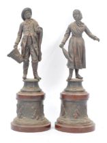 TWO 19TH CENTURY SPELTER FIGURES OF FISHING COUPLE