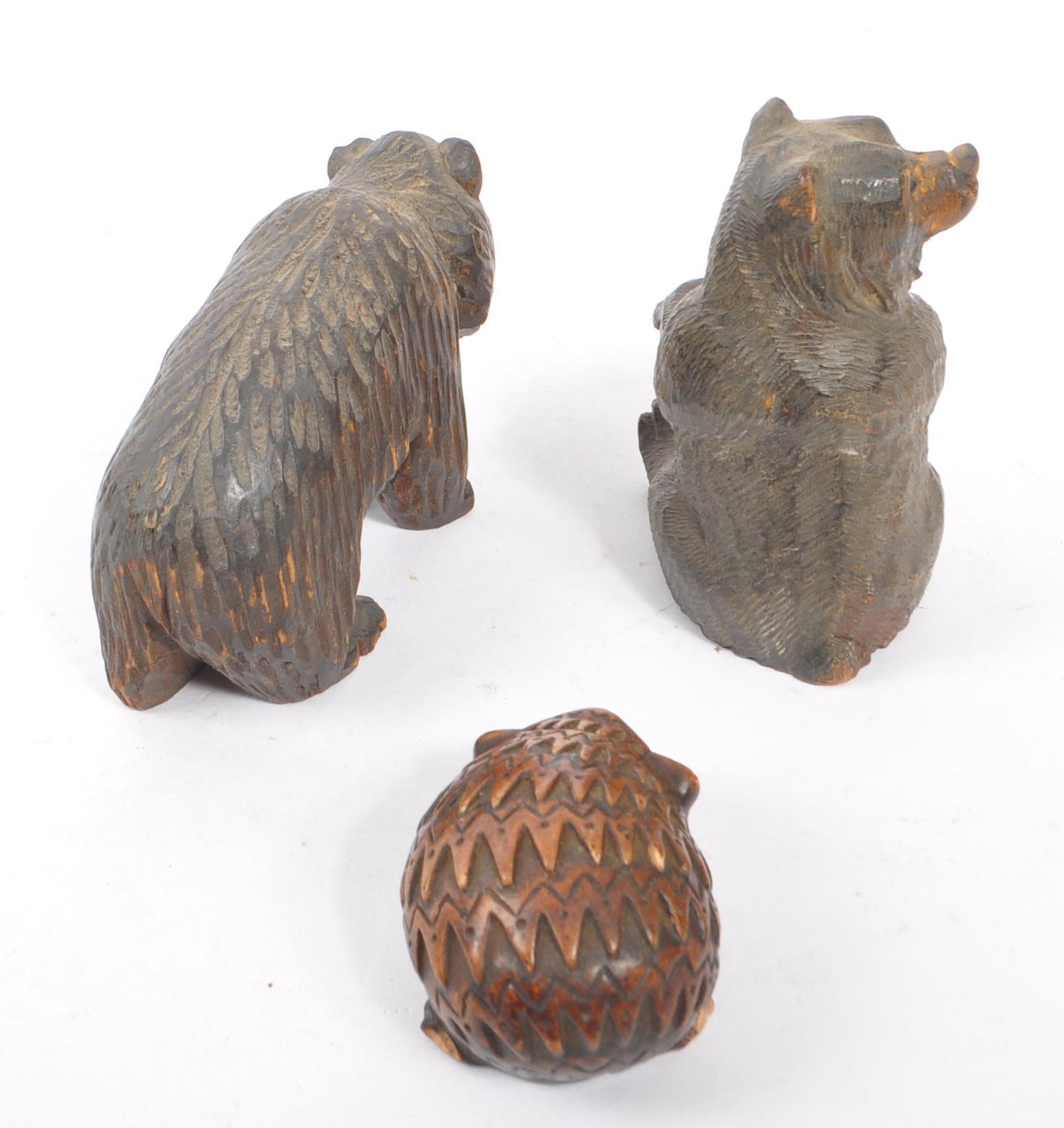 TWO BLACK FOREST HAND CARVED WOODEN BEARS WITH HEDGEHOG - Image 3 of 6