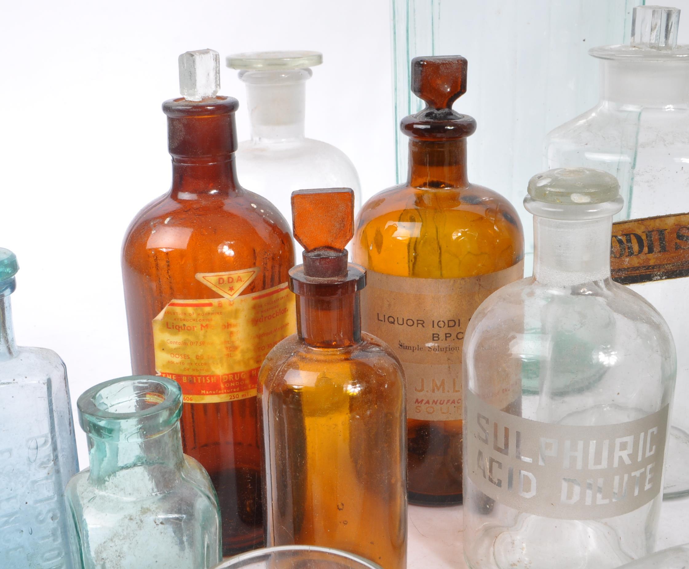 A large collection of 19th and 20th century glass bottles. The collection consisting of a variety of - Image 6 of 10