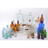 A large collection of 19th and 20th century glass bottles. The collection consisting of a variety of