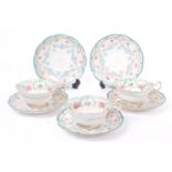 THREE EARLY 20TH CENTURY ROYAL DOULTON TEACUP & SAUCER