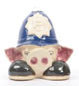 CERAMIC POLICEMAN PIG MONEY BOX SIGNED ' CHAS '