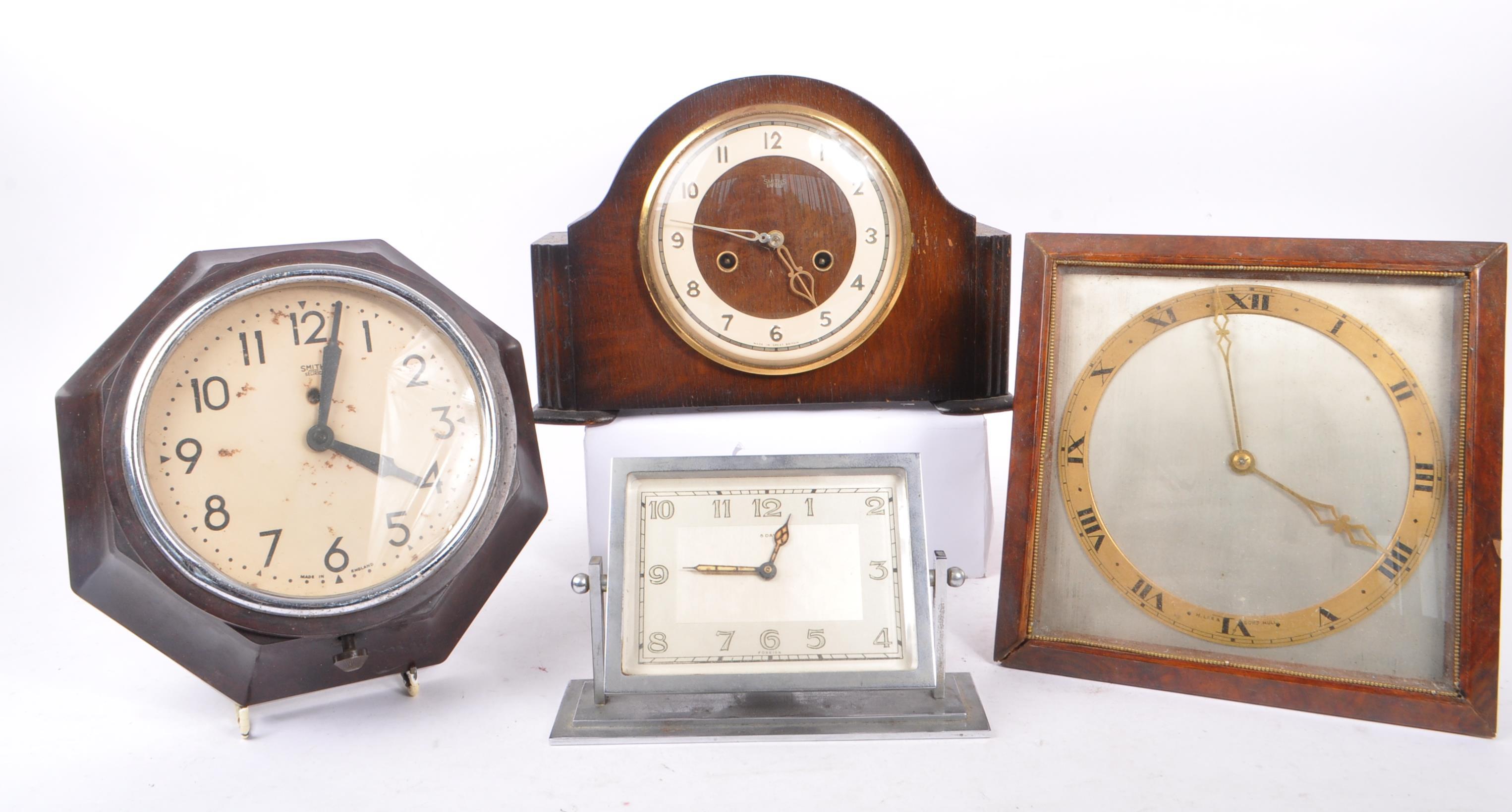 SMITHS - A COLLECTION OF WALL AND MANTLE CLOCKS