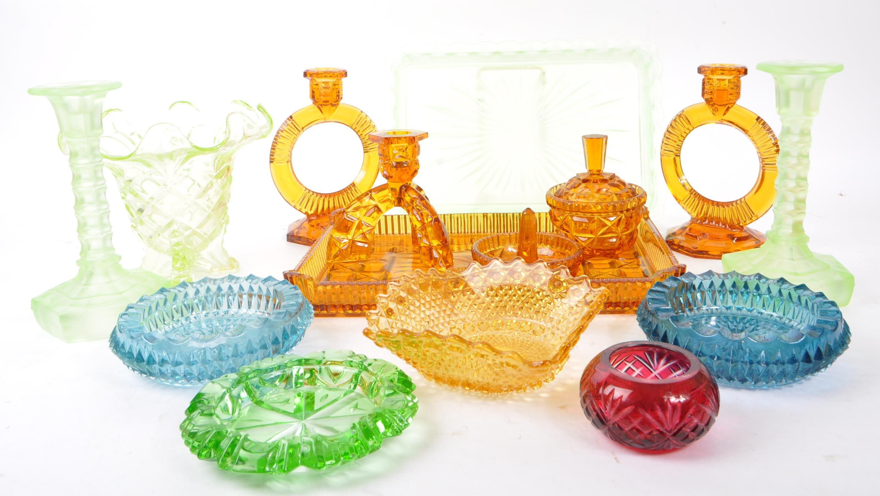 COLLECTION OF 20TH CENTURY COLOURED CUT GLASS