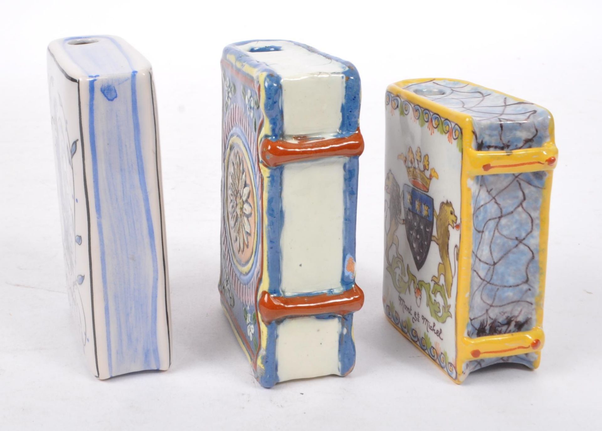 THREE CERAMIC HAND PAINTED BOTTLES IN THE FORM OF BOOKS - Image 2 of 6