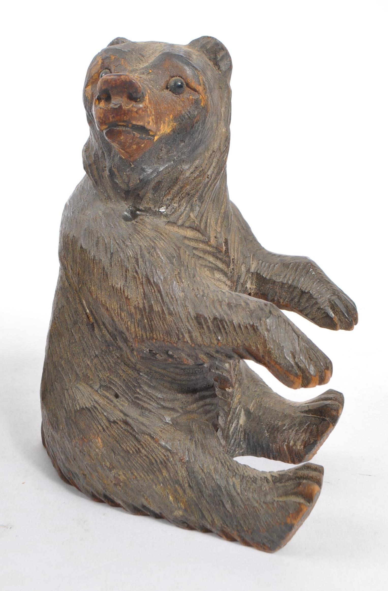 TWO BLACK FOREST HAND CARVED WOODEN BEARS WITH HEDGEHOG - Image 4 of 6