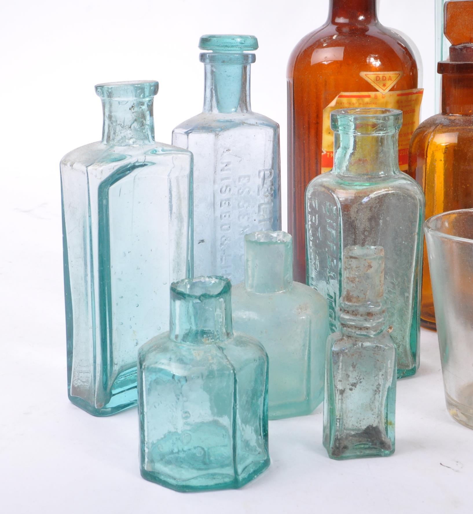 A large collection of 19th and 20th century glass bottles. The collection consisting of a variety of - Image 2 of 10