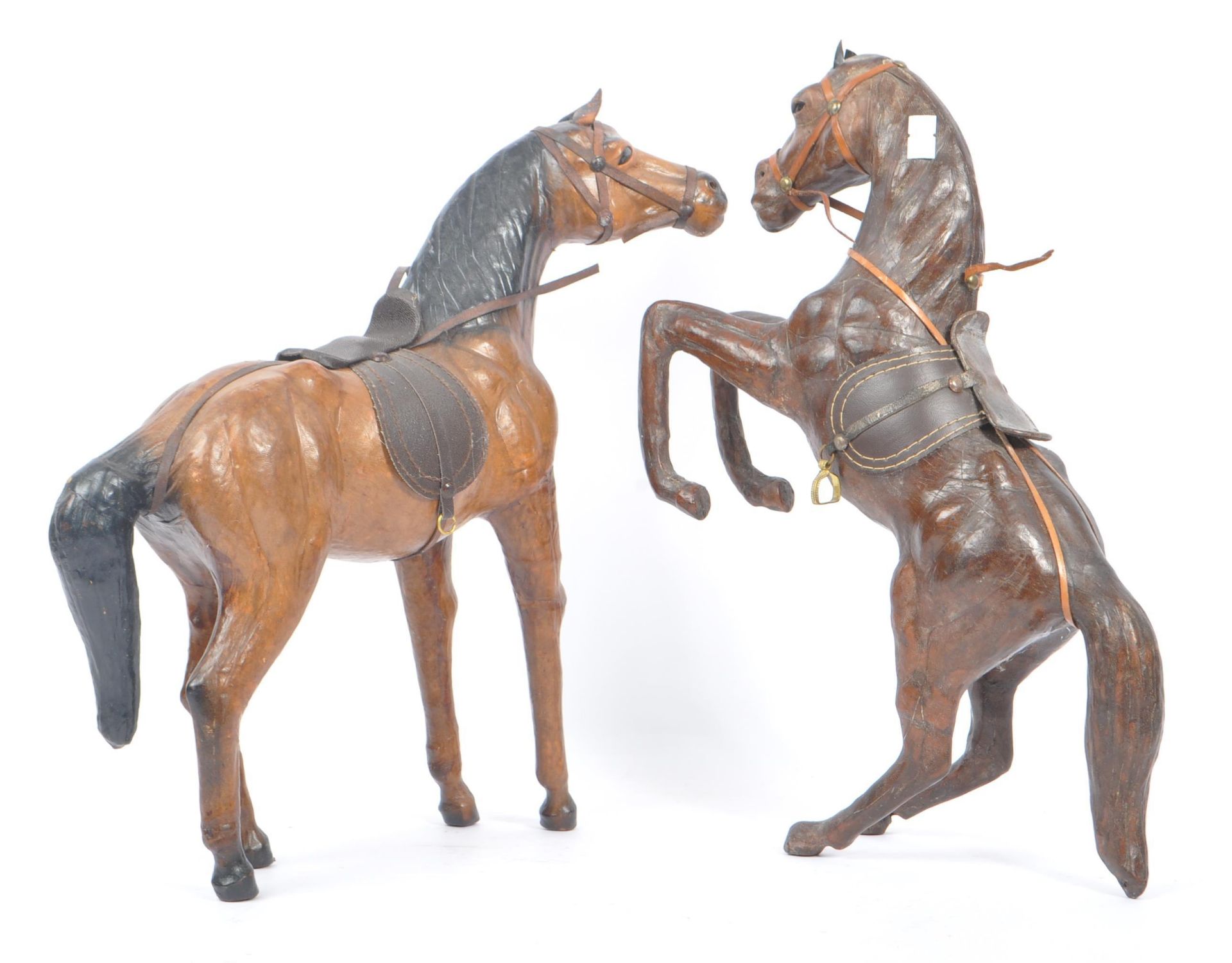 MANNER OF LIBERTY & CO - TWO LARGE LEATHER HORSES - Image 2 of 6