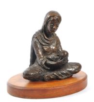 VINTAGE 20TH CENTURY SPELTER FIGURE OF WOMAN HOLDING BABY