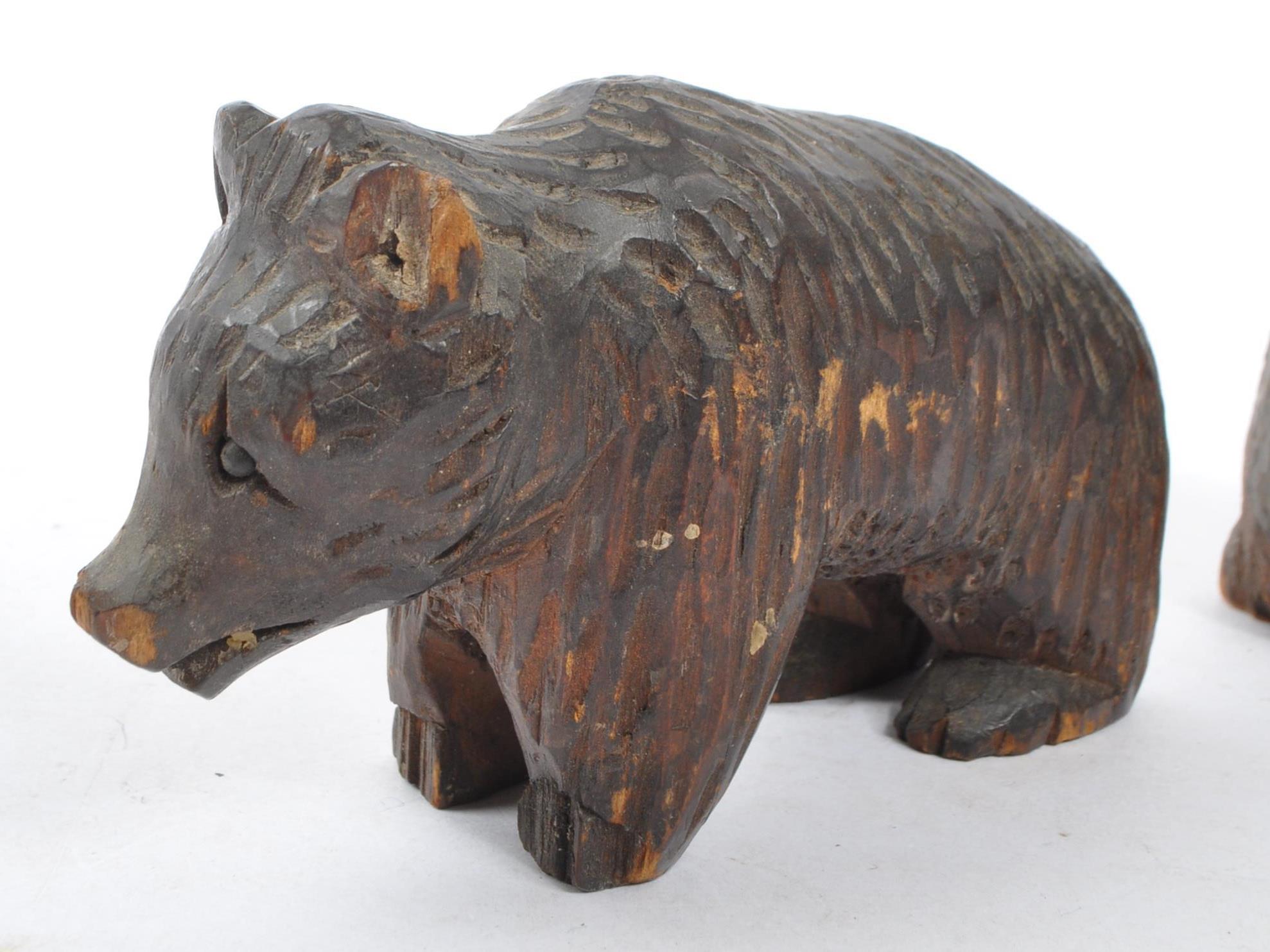 TWO BLACK FOREST HAND CARVED WOODEN BEARS WITH HEDGEHOG - Image 6 of 6