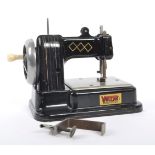 VOLCAN - MID 20TH CENTURY TOY TIN SEWING MACHINE