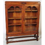 EARLY 20TH CENTURY OAK GLAZED BOOKCASE