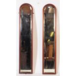 PAIR OF 1920S ELONGATED ARCHED WALL MIRRORS