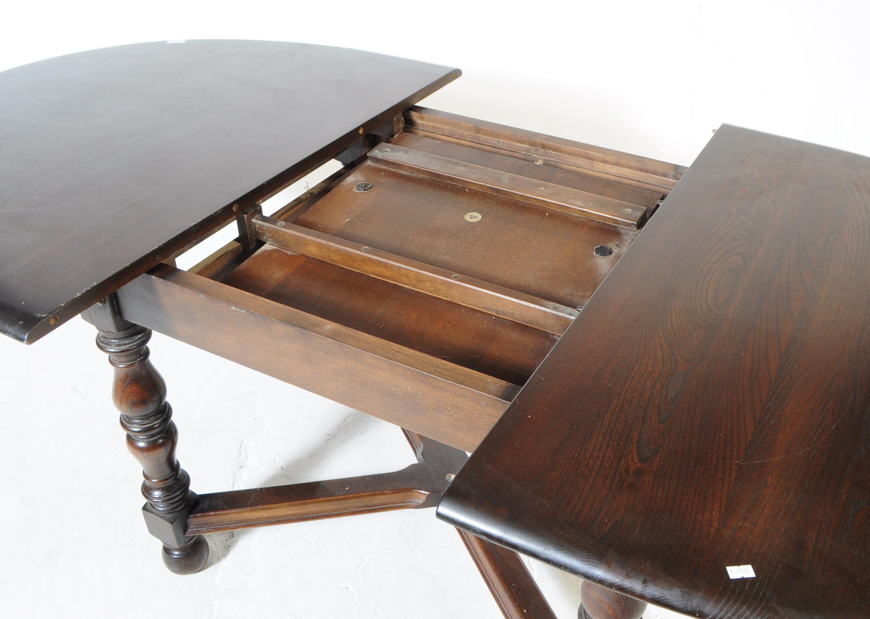 ERCOL - MODEL 705 - OLD COLONIAL ELM DINING TABLE - Image 4 of 8