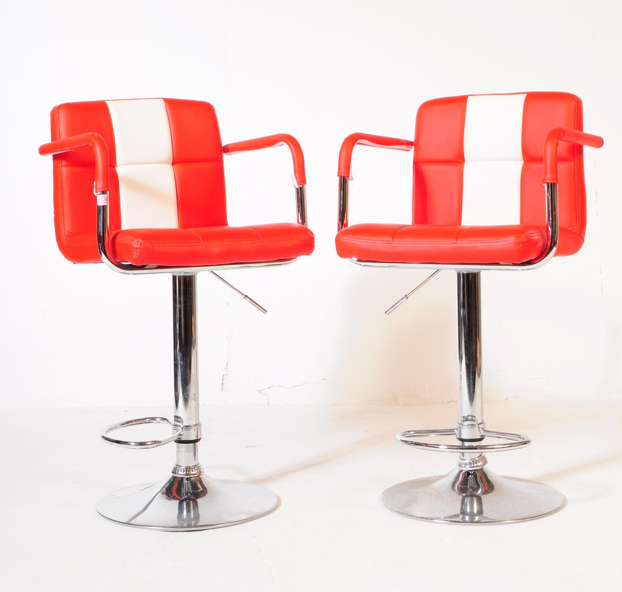 PAIR OF CONTEMPORARY VINYL RED & WHITE BAR STOOLS