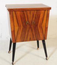 MID CENTURY VENEERED SEWING CABINET