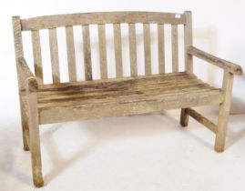 BRITISH MODERN DESIGN - LATE 20TH CENTURY TEAK GARDEN BENCH