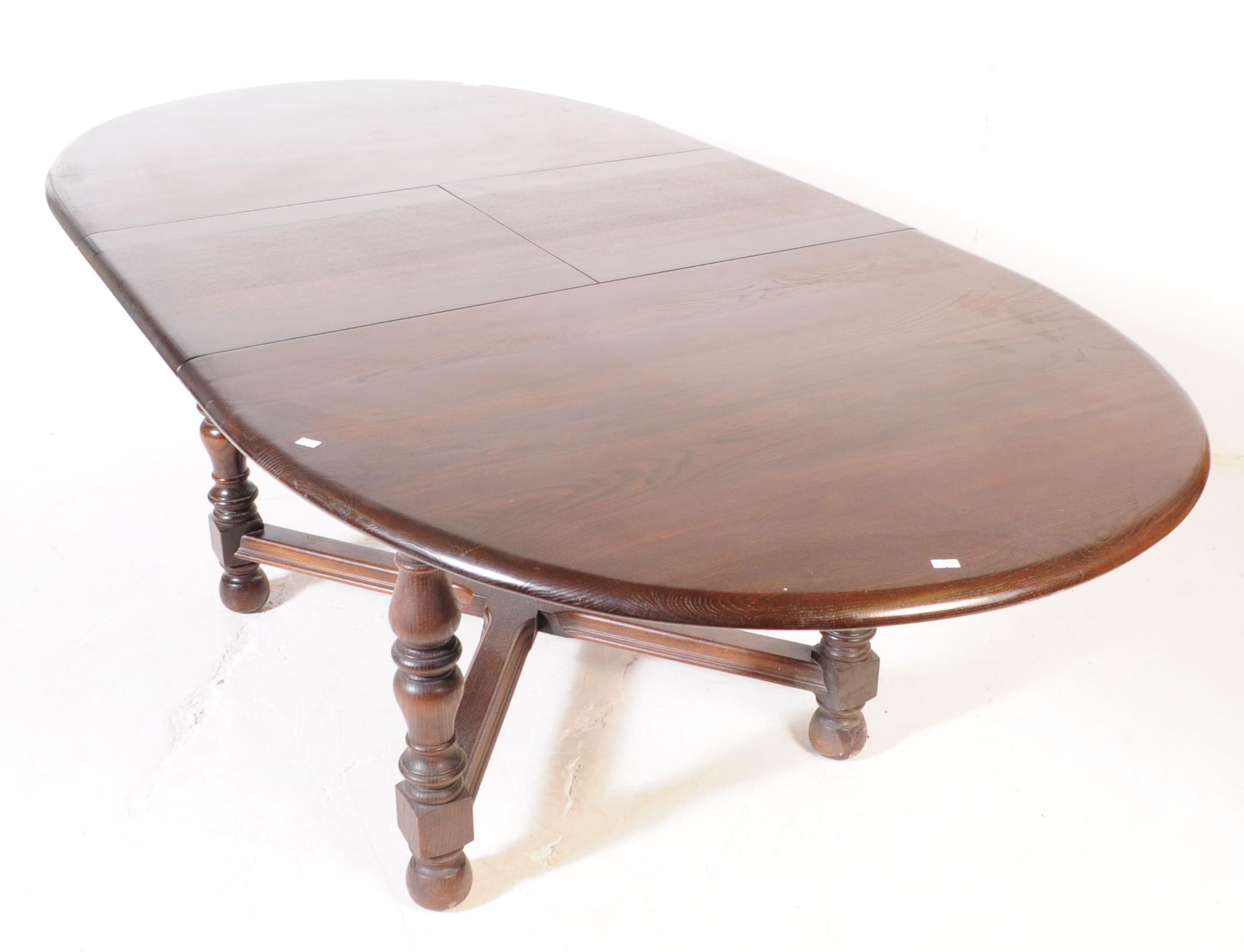 ERCOL - MODEL 705 - OLD COLONIAL ELM DINING TABLE - Image 2 of 8