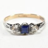 9CT GOLD AND SILVER SPINEL SET THREE STONE RING