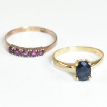 TWO YELLOW METAL & GEM SET RINGS