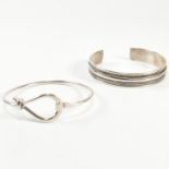 TWO SILVER BANGLES