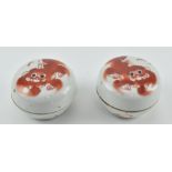 PAIR OF IRON RED LION SEALPASTE BOXES 民国 矾红戏狮印泥盒一对