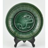 STONEWARE GREEN GLAZED "DRAGON" RELIEF CHARGER 绿釉三爪龙浮雕盘