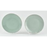 PAIR OF QING DYNASTY CELADON PLATES 清 青釉盘子一对