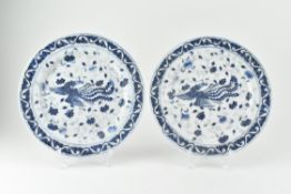 PAIR OF BLUE AND WHITE PHOENIX CHARGERS 晚清牡丹凤凰盘一对