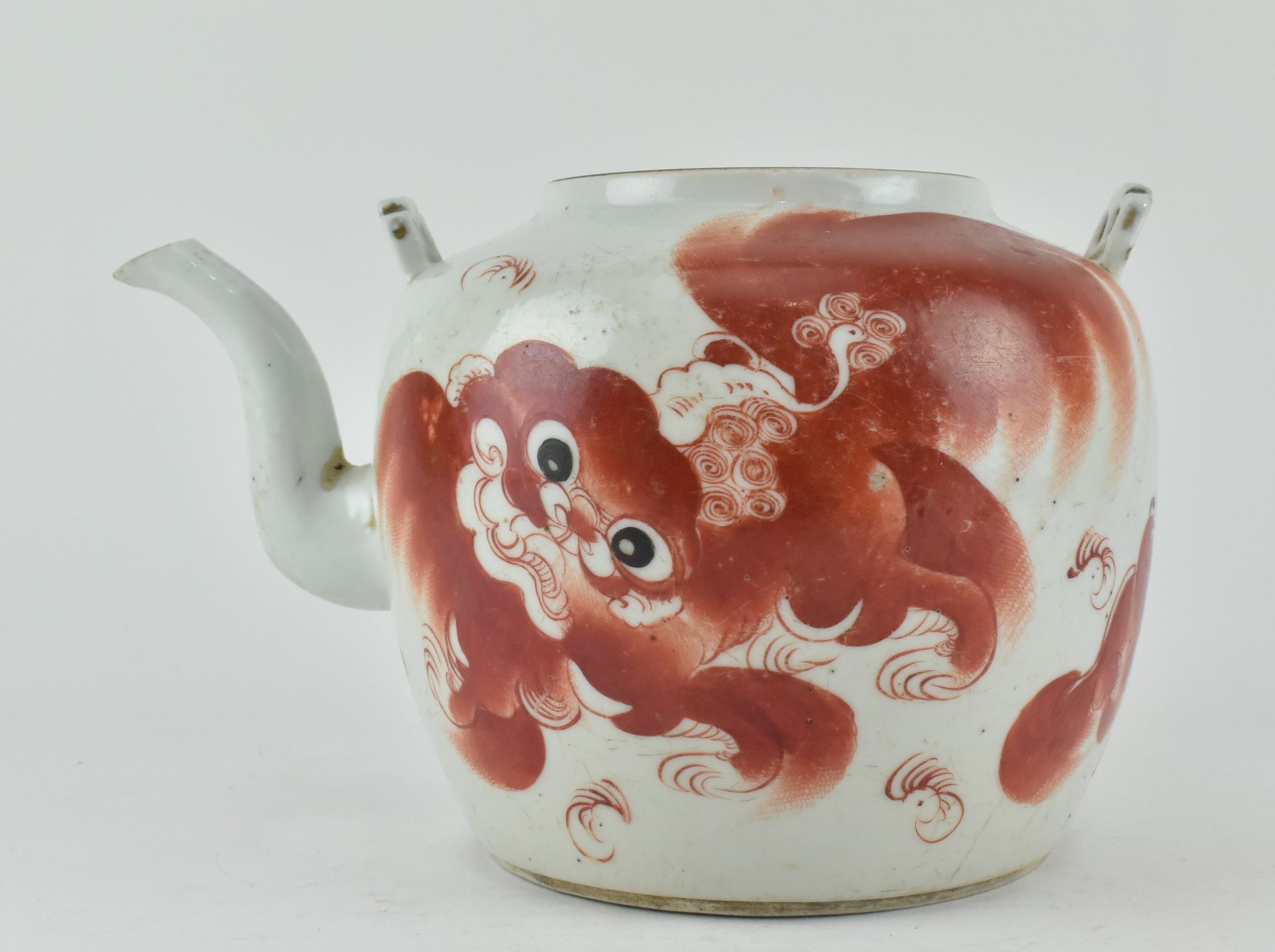 QING DYNASTY IRON RED ‘’LION” TEAPOT 清 矾红狮子茶壶