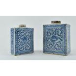 TWO QING DYNASTY BLUE AND WHITE TEA CADDIES 清 青花花卉茶叶罐