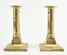 PAIR OF EARLY 19TH CENTURY GEORGIAN BRASS CANDLESTICKS