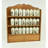 HUMMEL SPICE RACK AND TWENTY-FOUR CERAMIC SPICE JARS