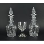 PAIR OF VICTORIAN GLASS DECANTERS & A GEORGE III DRINKING GLASS