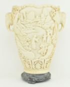 20TH CENTURY CHINESE RESIN CARVED VASE WITH ELEPHANT HANDLES
