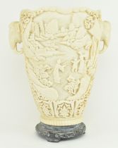 20TH CENTURY CHINESE RESIN CARVED VASE WITH ELEPHANT HANDLES