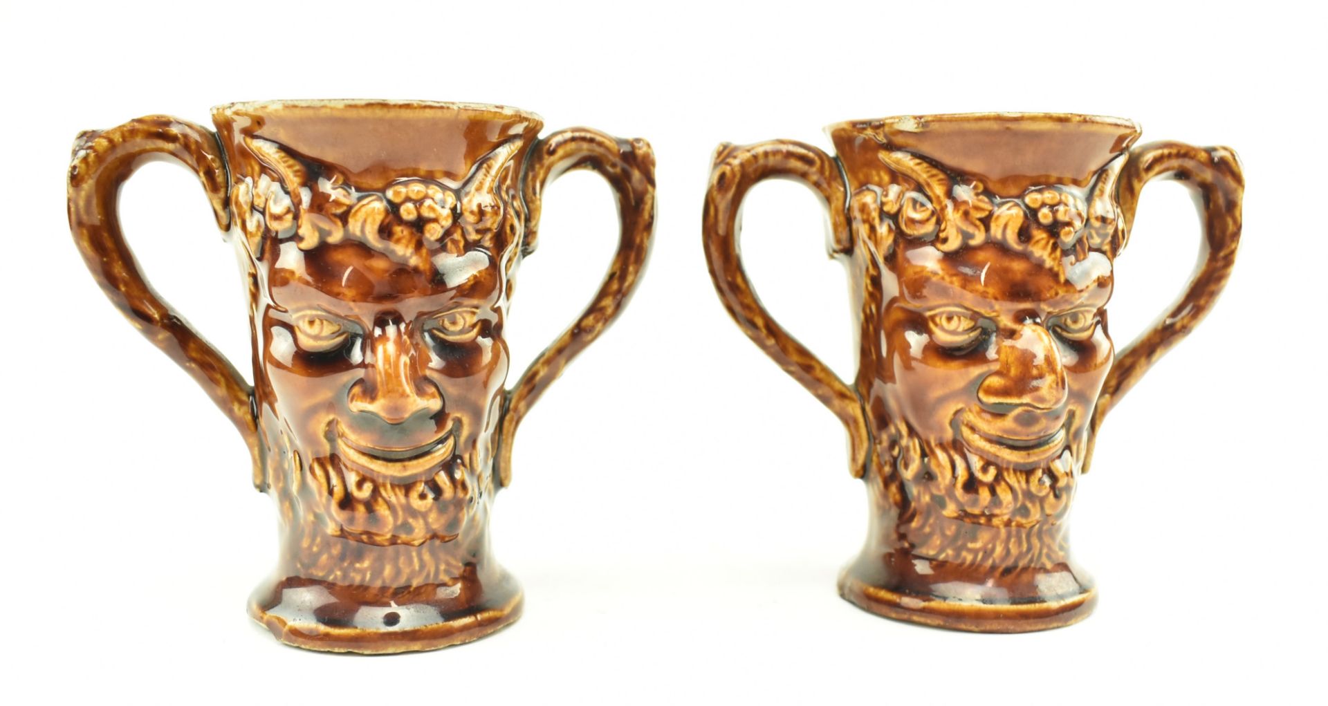 PAIR OF VICTORIAN STONEWARE TWIN HANDLED BACCHUS CUPS