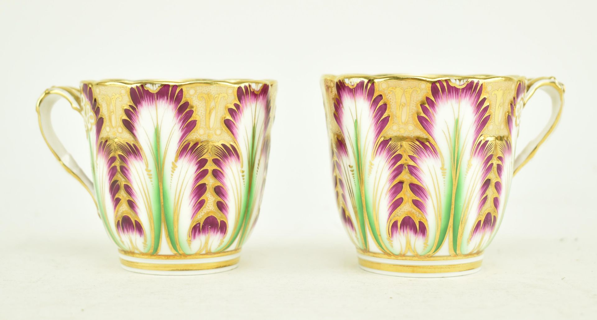 TWO MID 19TH CENTURY RIDGWAY PORCELAIN TEA CUPS WITH HANDLE