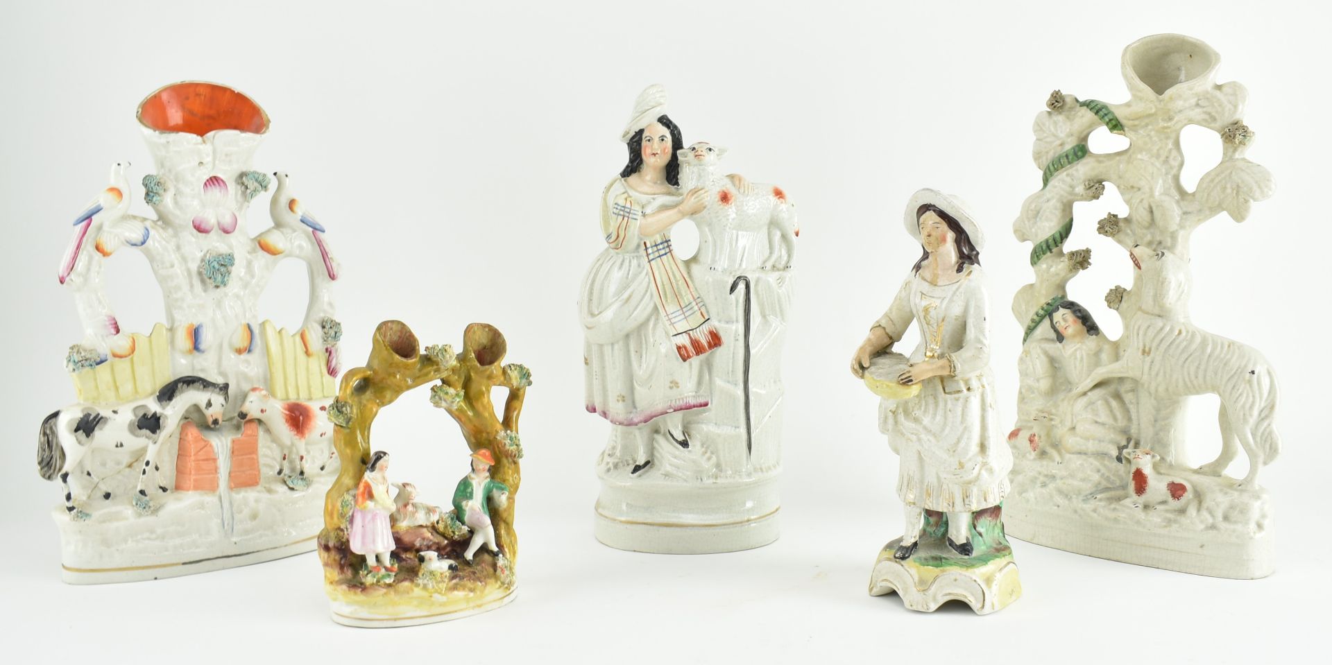 COLLECTION OF FIVE STAFFORDSHIRE SPILL VASES AND FIGURINES