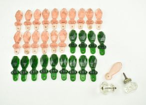 INTERIORS. COLLECTION OF PINK & GREEN CUT GLASS KEYHOLE COVERS
