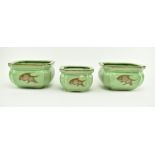 COLLECTION OF THREE CHINESE CRACKLE CERAMIC KOI FISH POTS