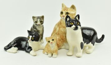 FIVE WINSTANLEY CERAMIC CATS WITH GLASS EYES