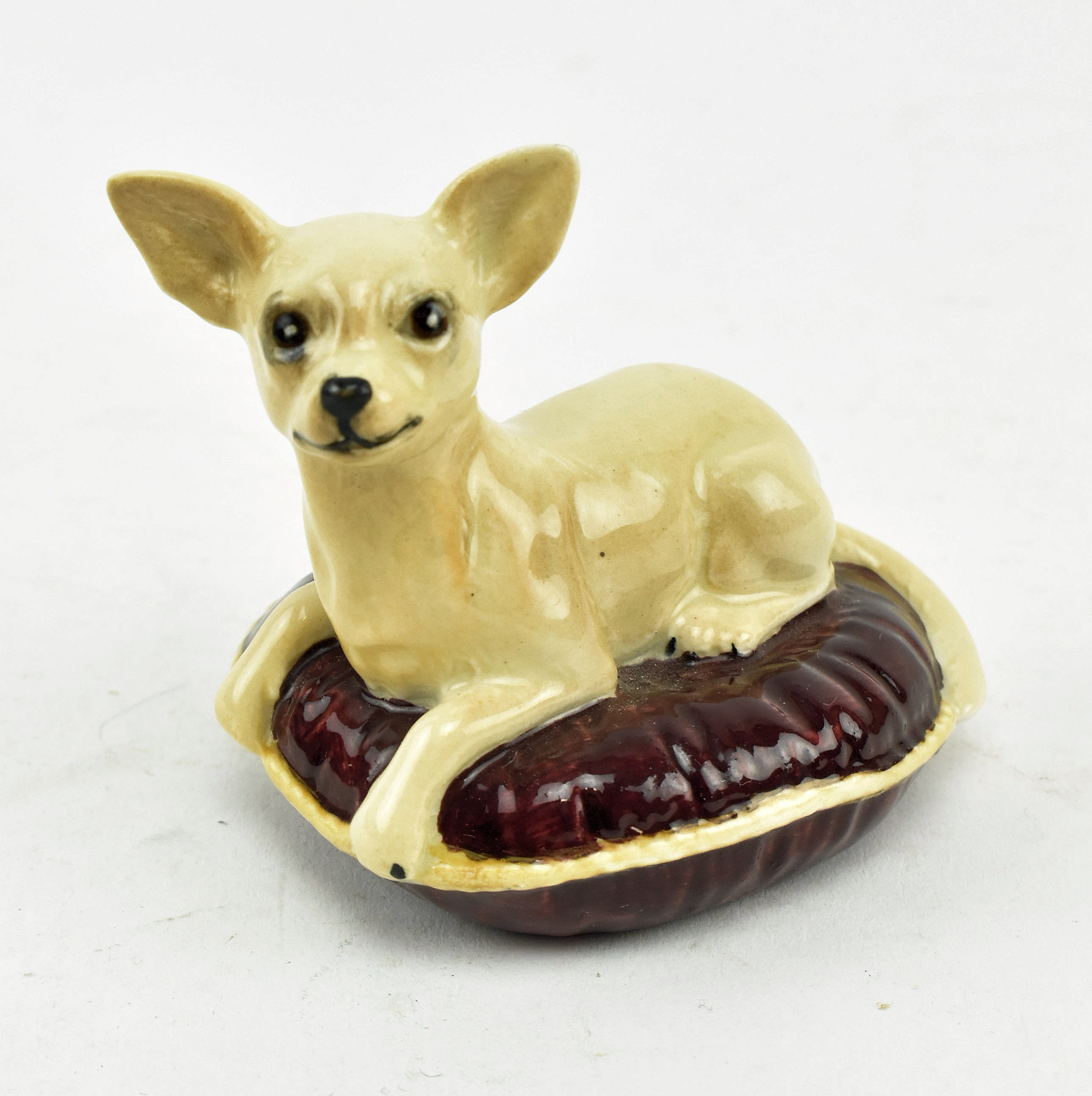 BESWICK - MID CENTURY PORCELAIN FIGURINE OF DOG ON PILLOW