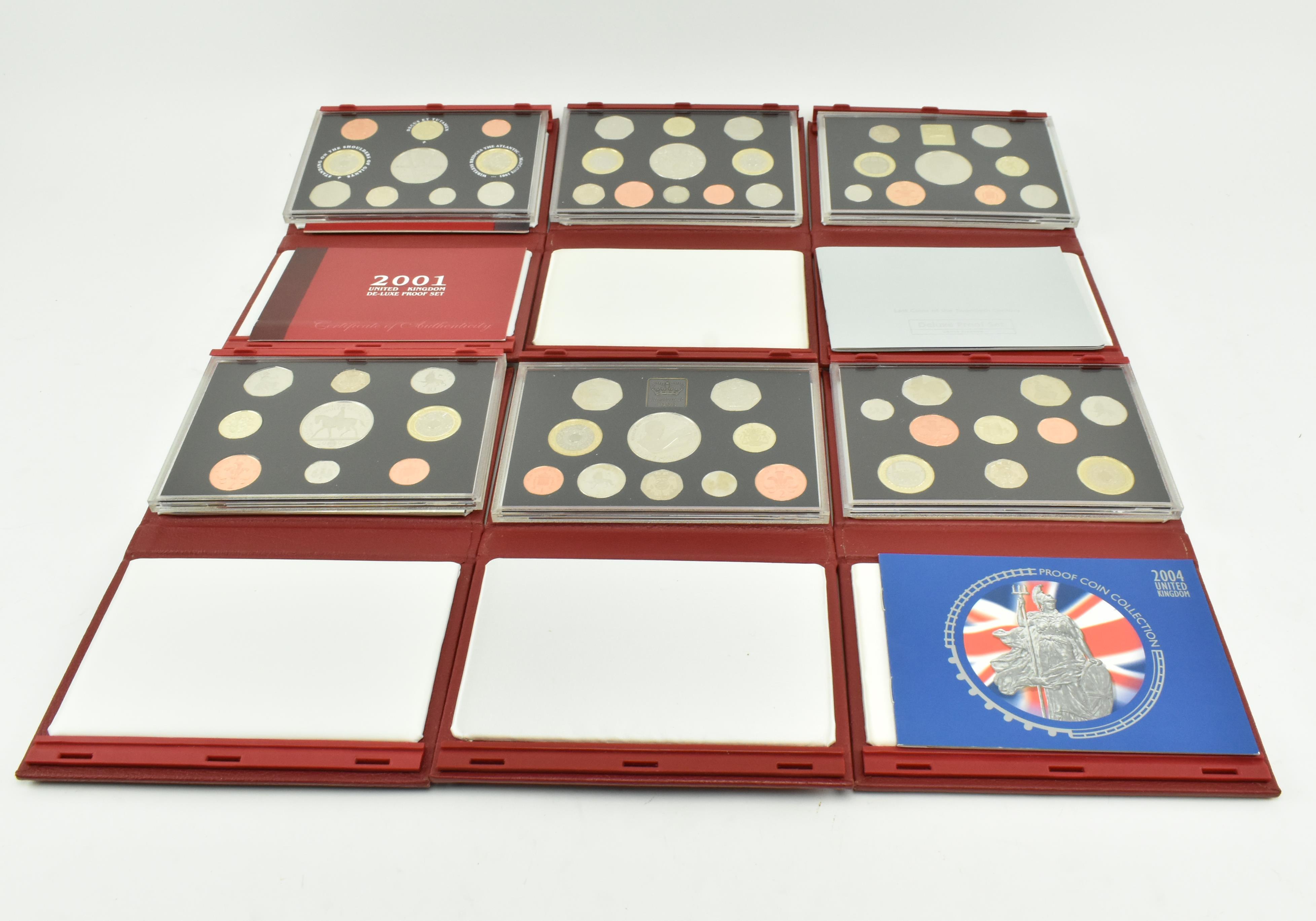 SIX UNITED KINGDOM DELUXE COIN PROOF SETS, 1999-2004