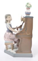 LLADRO - 'PRACTICE MAKES PERFECT' - GIRL PLAYING PIANO FIGURE